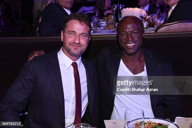 Gerard Butler and Seal at the FIDF Western Region Gala held at The Beverly Hilton Hotel on November 2, 2017 in Beverly Hills, California.