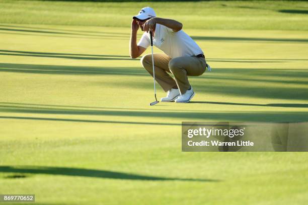 Nicolas Colsaerts of Belgium lines up a putt on the 18th green during the second round of the Turkish Airlines Open at the Regnum Carya Golf & Spa...