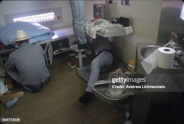 Corrections officers search every cell in Texas' Coffield Unit for contraband and weapons on March 15, 1998 in Tennessee Colony, Texas. Periodic...