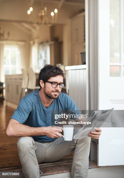 checking out the news - weekend activities stock pictures, royalty-free photos & images