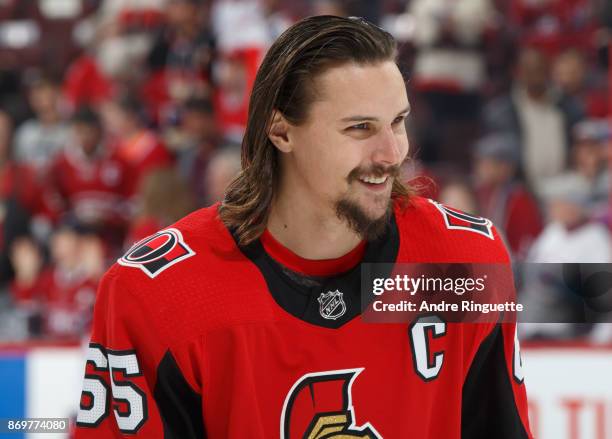 Erik Karlsson of the Ottawa Senators smiles during warmup prior to a game against the Montreal Canadiens at Canadian Tire Centre on October 30, 2017...