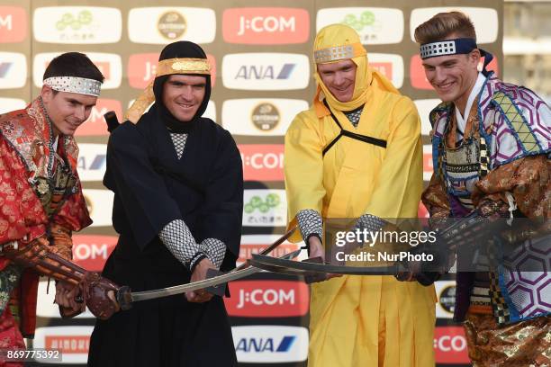 Warren BARGUIL, Greg VAN AVERMAET , Christopher FROOME and Marcel KITTEL at the end of Samurai vs Ninja combat demonstration at the 5th edition of...