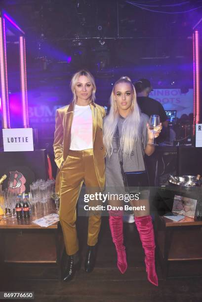 Lou Teasdale and Lottie Tomlinson arrive at Lottie Tomlinson's "Rainbow Roots" book launch at Tape London on November 2, 2017 in London, England.