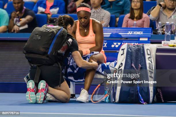 Sloane Stephens of United States receives medical treatment during the singles Round Robin match of the WTA Elite Trophy Zhuhai 2017 against Barbora...