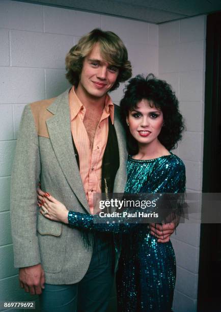 Marie Osmond and John Schneider meet and perform a duet at the Children's Miracle Network Telethon. November 28, 1983 Telethon, Los Angeles,...