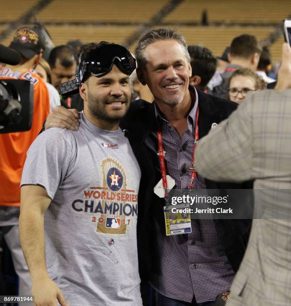 Jose Altuve of the Houston Astros and Hall of Famer Craig Biggio celebrate on the field after the Astros defeated the Los Angeles Dodgers in Game 7...