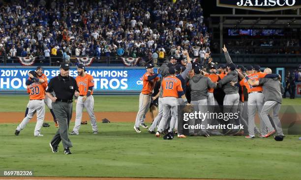 The Houston Astros celebrate defeating the Los Angeles Dodgers 5-1 in game seven to win the 2017 World Series at Dodger Stadium on November 1, 2017...