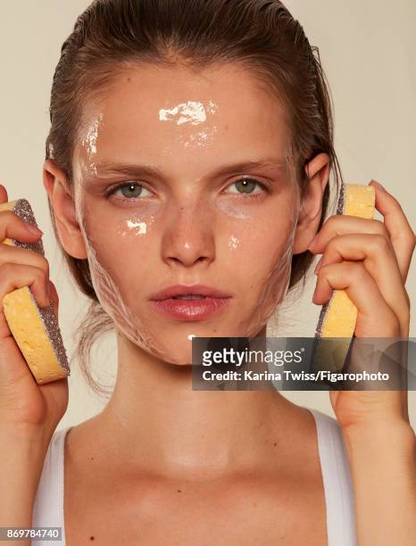 Model Marie-Louise Wedel poses at a beauty shoot for Madame Figaro on September 19, 2017 in Paris, France. Facial peel by Galenic. Tank top ....