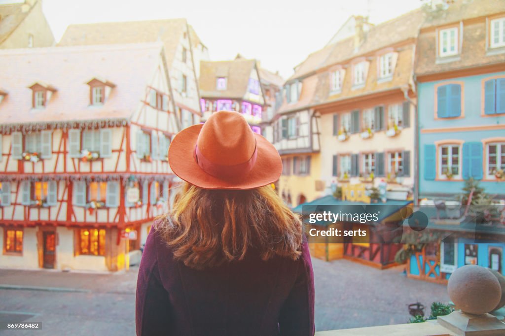 Young woman enjoying Christmas in Colmar, France