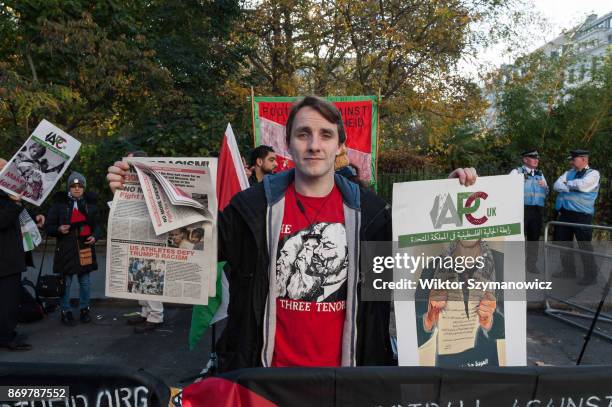 Group of pro-Palestinian demonstrators gathered to protest against Israel's Prime Minister Benjamin Netanyahu, Israeli war crimes and military...