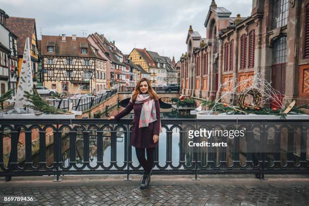 young woman enjoying in colmar, france - canal disney stock pictures, royalty-free photos & images