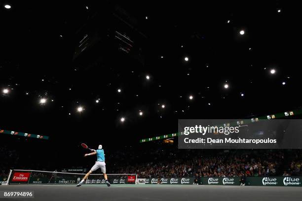 John Isner of the USA plays a forehand against Juan Martin del Potro of Argentina during Day 5 of the Rolex Paris Masters held at the AccorHotels...