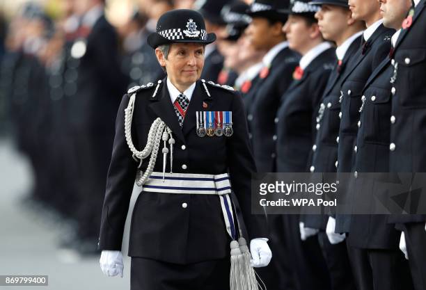 Metropolitan Police Commissioner Cressida Dick inspects police cadets at the Metropolitan Police Service Passing Out Parade in Hendon on November 3,...