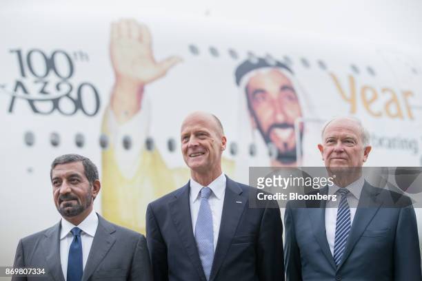 Sheikh Ahmed bin Saeed Al Maktoum, chief executive officer of Emirates Airlines, left, Tom Enders, chief executive officer of Airbus SE, center, and...