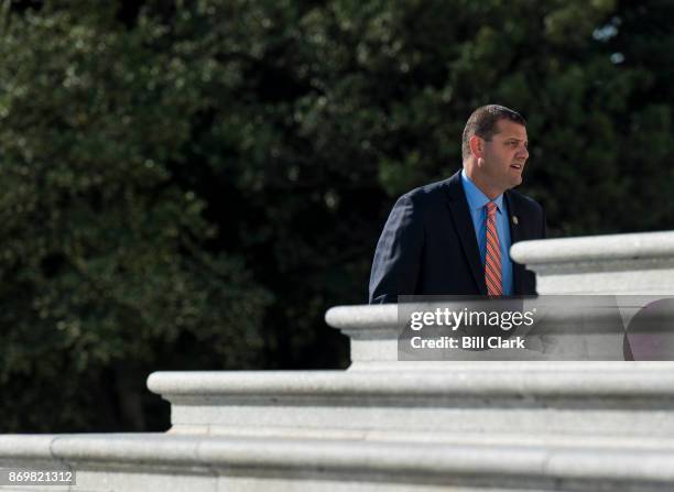 Rep. David Valadao, R-Calif., walks up the House steps for votes in the Capitol on Friday, Nov. 3, 2017.