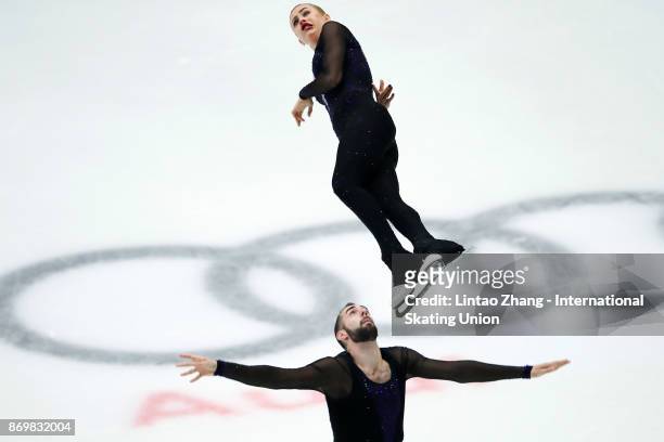 Ashley Cain and Timothy Leduc of United States compete in the Pairs Short Program on day one of Audi Cup of China ISU Grand Prix of Figure Skating...