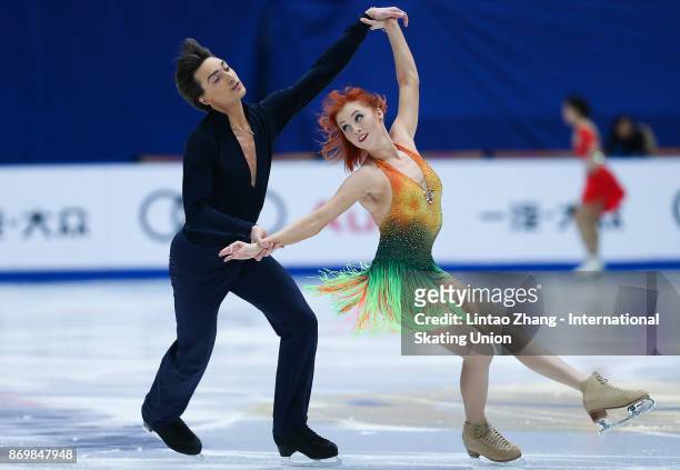 Tiffani Zagorski and Jonathan Guerreiro of Russia compete in the Ice Dance Short Dance on day one of Audi Cup of China ISU Grand Prix of Figure...