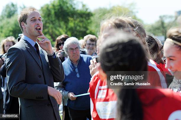 Prince William, President of The Football Association meets members of the public as he visits Kingshurst Sporting FC on May 11, 2009 in Kingshurst,...