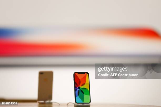 The new iPhone X is seen in the Apple Store Union Square prior to launch on November 3 in San Francisco, California. Apple's iPhone X hit stores...