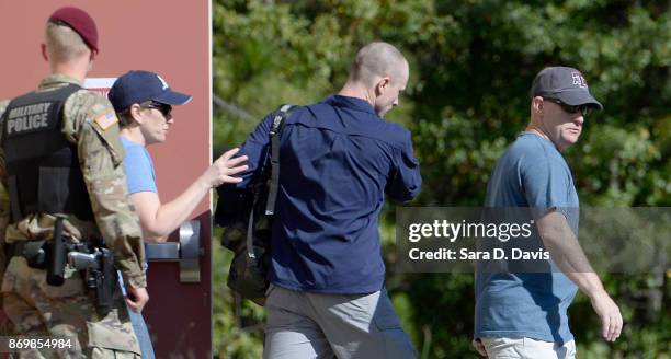Bowe Bergdah , demoted to Private from Sergeant, is escorted from the Ft. Bragg military courthouse on November 3, 2017 in Ft. Bragg, North Carolina....