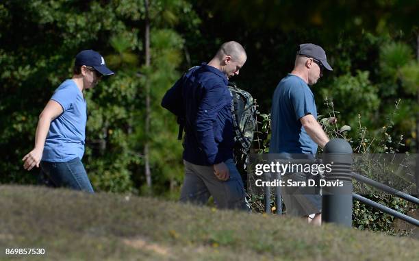 Bowe Bergdah , demoted to Private from Sergeant, is escorted from the Ft. Bragg military courthouse on November 3, 2017 in Ft. Bragg, North Carolina....