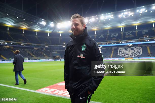 Interim coach Florian Kohfeldt of Bremen looks on prior to the Bundesliga match between Eintracht Frankfurt and SV Werder Bremen at Commerzbank-Arena...