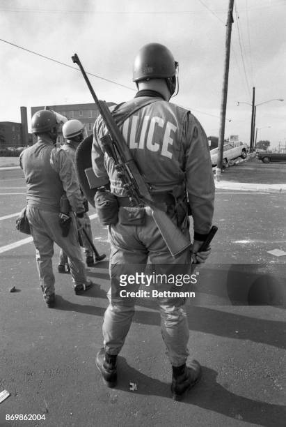 Police officers from Dover N.J. Were among those who moved into Asbury Park, N.J. To try to quell looting and firebombing. These officers are...