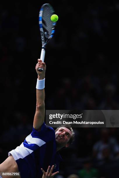 Julien Benneteau of France serves against Marin Cilic of Croatia during Day 5 of the Rolex Paris Masters held at the AccorHotels Arena on November 3,...