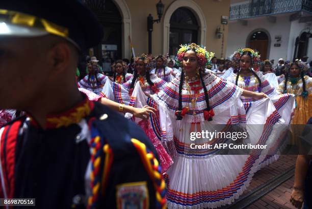 Dancers wearing traditional dress perform in a parade held to commemorate the 114th anniversary of Panama's independence from Colombia, in Panama...