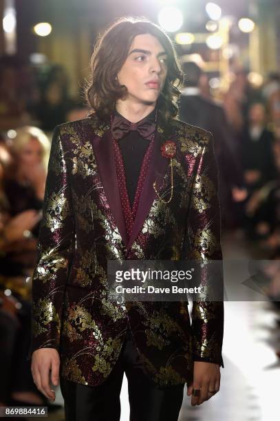 Sascha Bailey walks the Dolce & Gabbana Italian Christmas catwalk show at Harrods on November 2, 2017 in London, England.