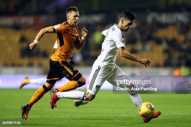 Rui Fonte of Fulham and Barry Douglas of Wolverhampton Wanderers in action during the Sky Bet Championship match between Wolverhampton Wanderers and...