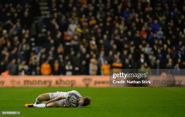 Tim Ream of Fulham goes down injured during the Sky Bet Championship match between Wolverhampton and Fulham at Molineux on November 3, 2017 in...