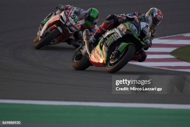 Jonathan Rea of Great Britain and KAWASAKI RACING TEAM leads Eugene Laverty of Ireland and Milwaukee Aprilia during the free practice 3 of FIM...