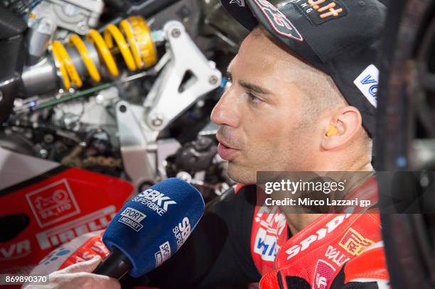 Marco Melandri of Italy and ARUBA.IT RACING-DUCATI speaks with journalists on the grid during the race 1 of FIM Superbike World Championship in Qatar...