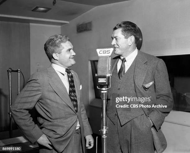 Left to right, CBS newsman Bill Leonard with former heavyweight champion boxer Gene Tunney. Bill Leonard hosts the CBS Radio program, This is New...