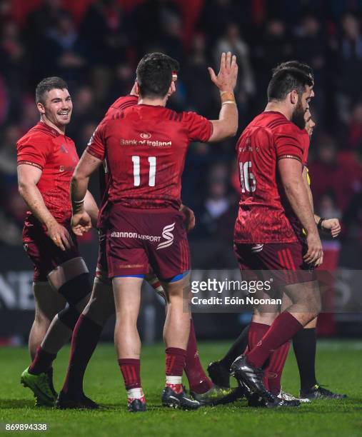 Cork , Ireland - 3 November 2017; Sam Arnold of Munster celebrates with team mate Alex Wootton after scoring his side's fifth try during the Guinness...