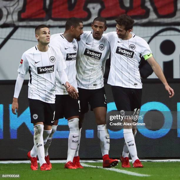 Sebastian Haller of Frankfurt celebrates his team's second goal with team mates Mijat Gacinovic, Kevin-Prince Boateng and David Abraham during the...