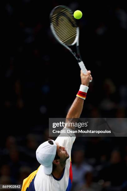 Fernando Verdasco of Spain serves against Jack Sock of the USA during Day 5 of the Rolex Paris Masters held at the AccorHotels Arena on November 3,...