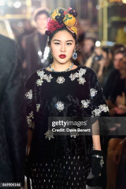 Natasha Lau walks the Dolce & Gabbana Italian Christmas catwalk show at Harrods on November 2, 2017 in London, England.