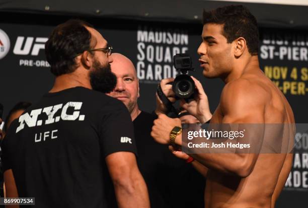 Johny Hendricks and Paulo Costa of Brazil face off during the UFC 217 weigh-in inside Madison Square Garden on November 3, 2017 in New York City.