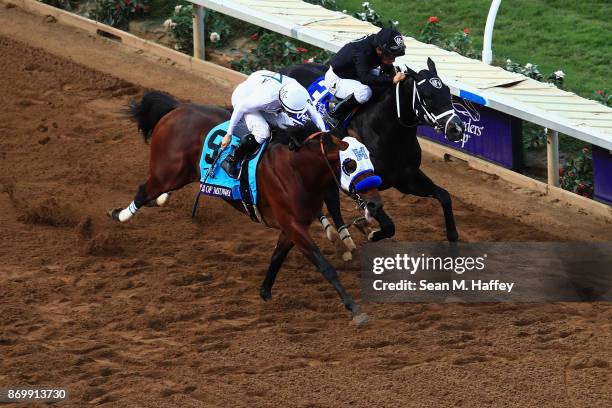 Battle Of Midway ridden by jockey Flavien Prat defeats Sharp Azteca ridden by jockey Paco Lopez to win the Las Vegas Breeder's Cup Dirt Mile on day...