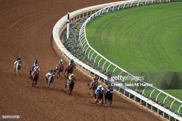 Battle Of Midway ridden by jockey Flavien Prat defeats Sharp Azteca ridden by jockey Paco Lopez to win the Las Vegas Breeder's Cup Dirt Mile on day...