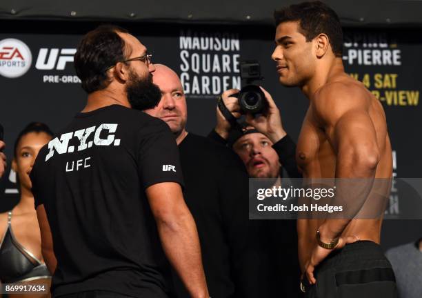 Johny Hendricks and Paulo Costa of Brazil face off during the UFC 217 weigh-in inside Madison Square Garden on November 3, 2017 in New York City.