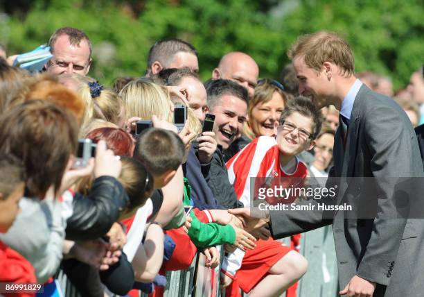 Prince William, President of The Football Association, meets members of the public as he visits Kingshurst Sporting FC on May 11, 2009 in Kingshurst,...