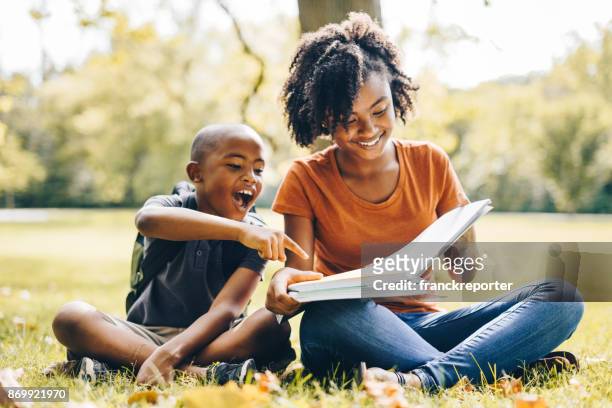 daughter study with the brother - family time stock pictures, royalty-free photos & images