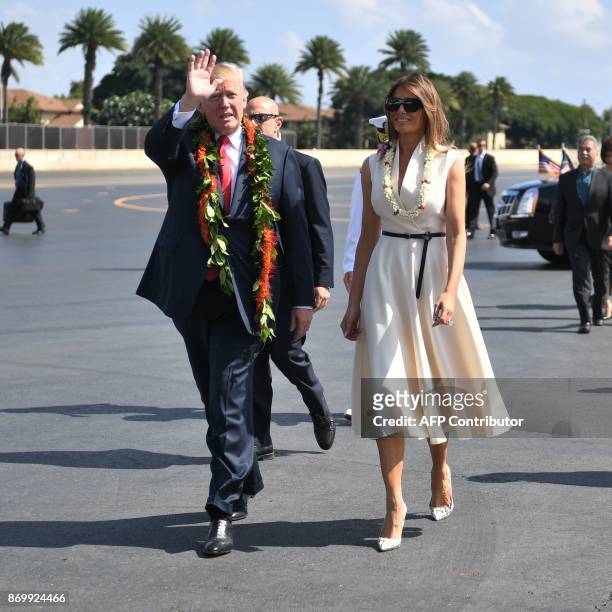 President Donald Trump and First Lady Melania Trump arrive at Joint Base Pearl Harbor-Hickam in Hawaii on November 3, 2017. The Trumps are in Hawaii...