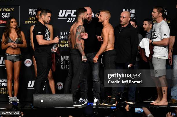 Cody Garbrandt and TJ Dillashaw face off during the UFC 217 weigh-in inside Madison Square Garden on November 3, 2017 in New York City.