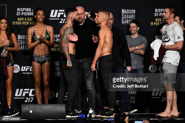 Cody Garbrandt and TJ Dillashaw face off during the UFC 217 weigh-in inside Madison Square Garden on November 3, 2017 in New York City.