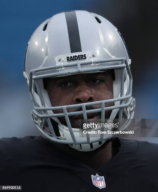 Clive Walford of the Oakland Raiders warms up before the start of NFL game action against the Buffalo Bills at New Era Field on October 29, 2017 in...