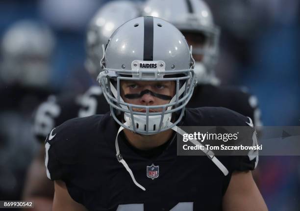 Erik Harris of the Oakland Raiders warms up before the start of NFL game action against the Buffalo Bills at New Era Field on October 29, 2017 in...